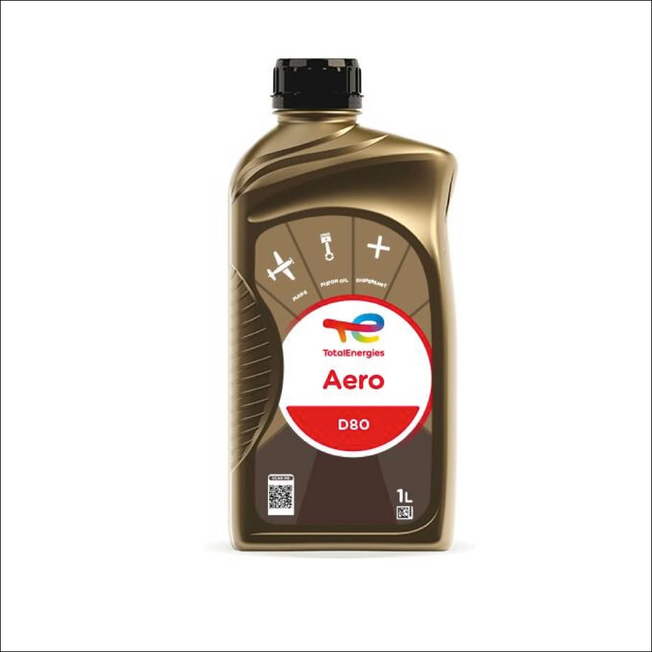 Bruine fles motorolie met een zwart dopje, een rood-wit etiket met de tekst "Total Aero 040" en pictogrammen van vliegtuigen.